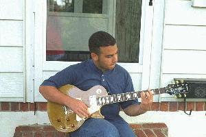 Danny playing his Les Paul gold top on his front steps